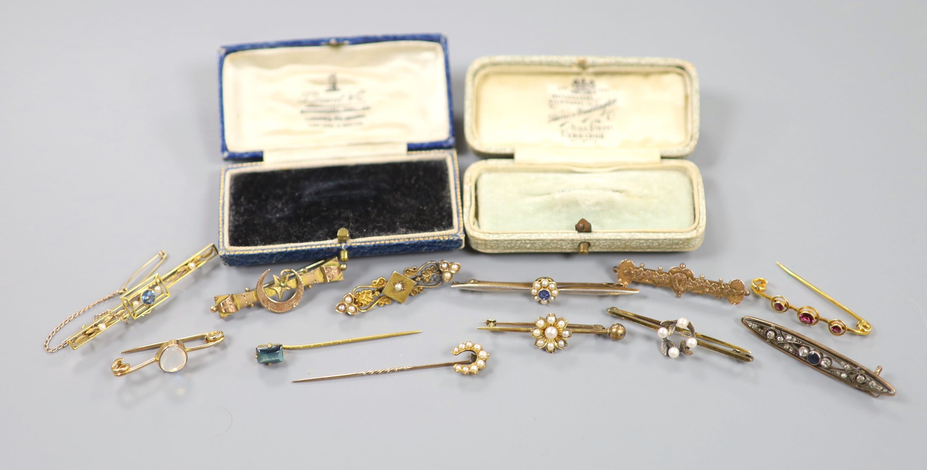 Two Edwardian 15ct and gem set bar brooches, including sapphire and seed pearl, gross 7.4 grams, three 9ct and gem set bar brooches, gross 6.1 grams, four yellow metal and gem set bar brooches, gross 10.4 grams, two yell